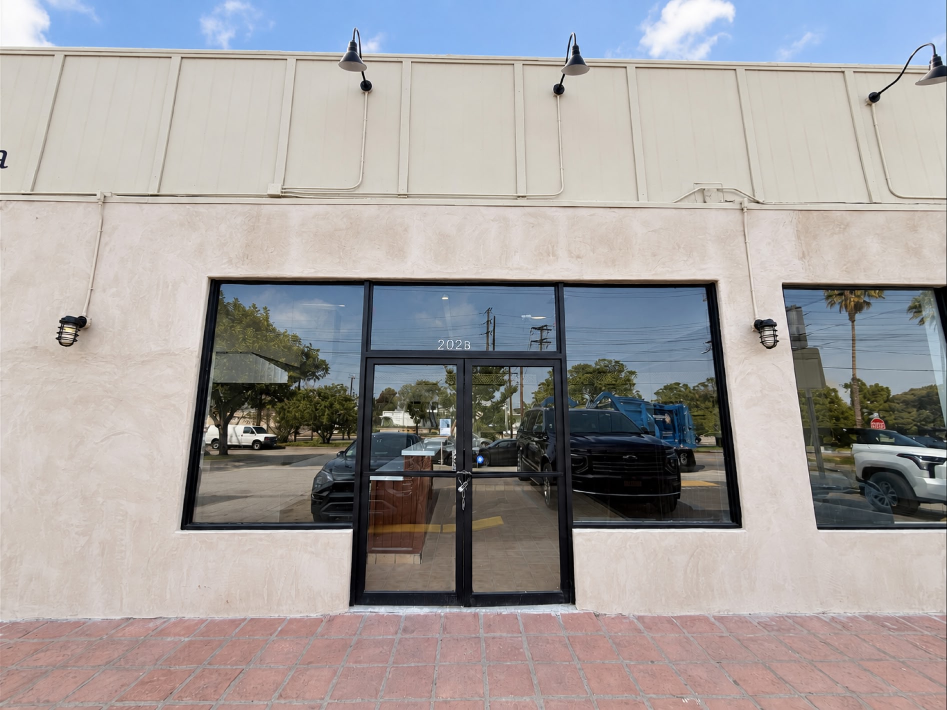 Street-facing storefront entrance at 202 E Imperial Ave