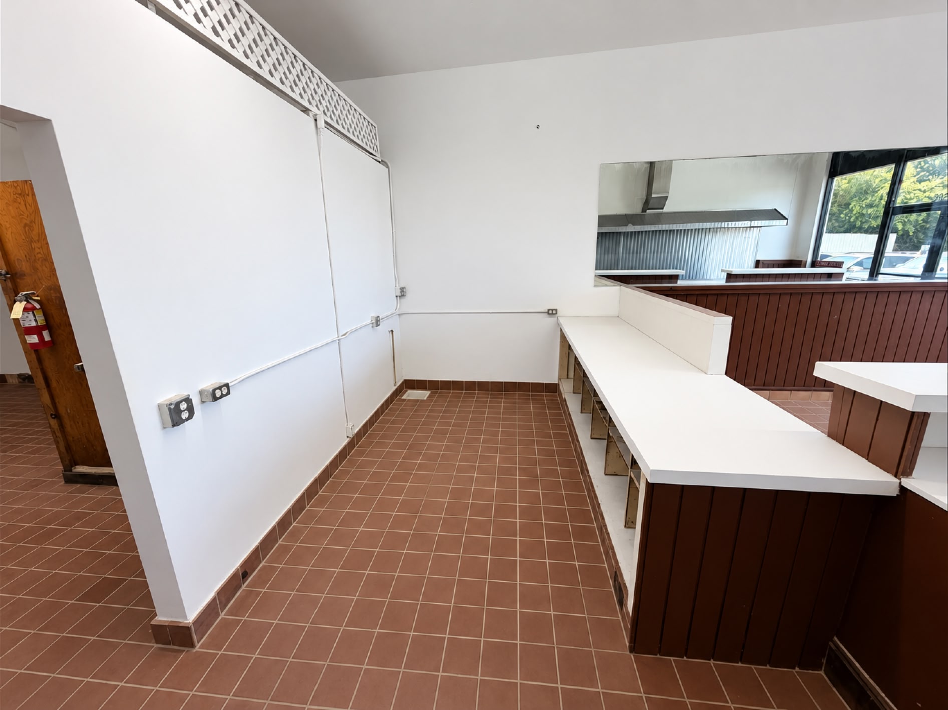Existing service counter and hood area within the suite